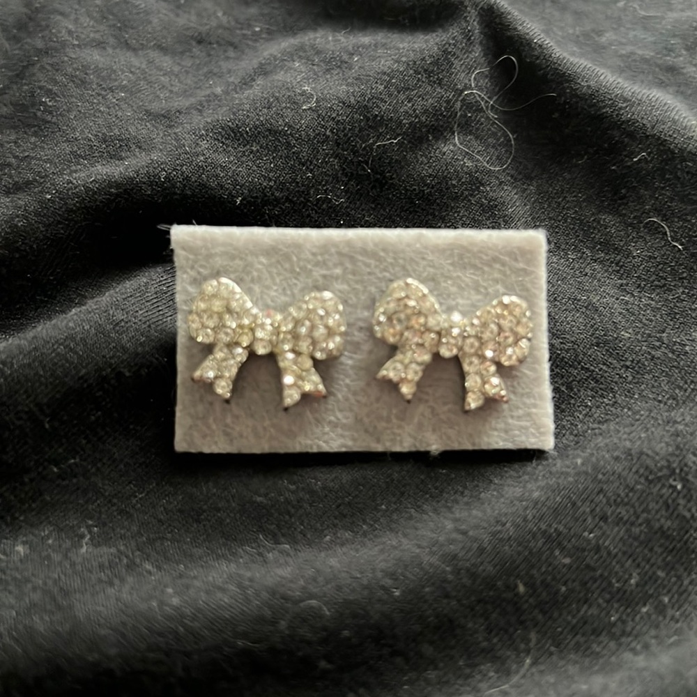 Sterling silver pave bow stud earrings